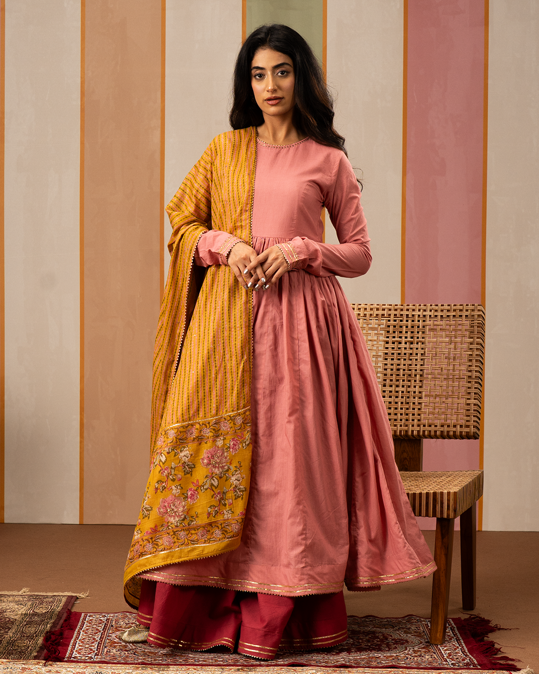 Pink Solid Cotton Flare Kurta Set with Printed Yellow Dupatta
